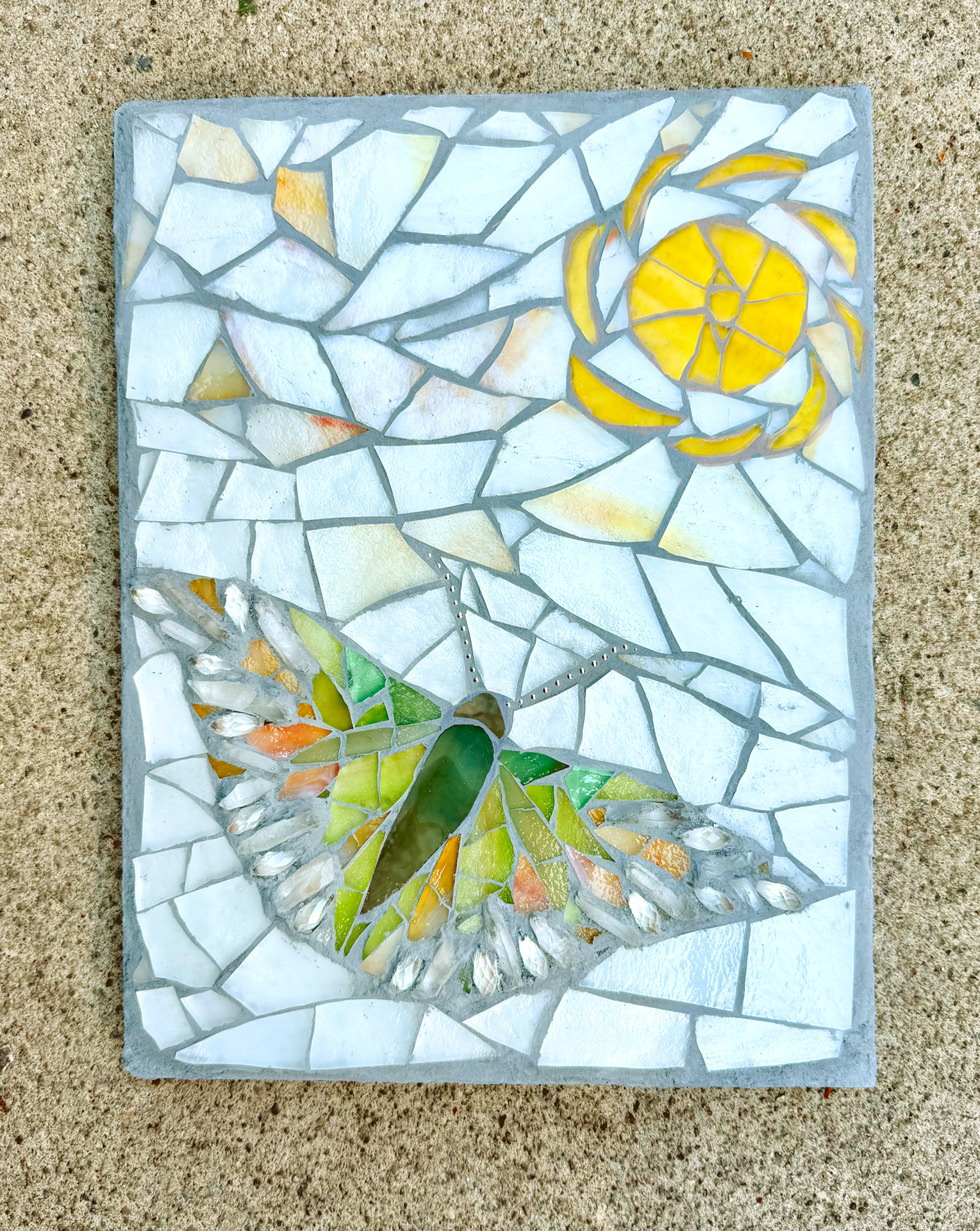 Butterfly and sun mosaic